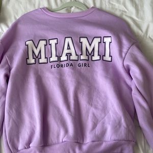 Purple Miami sweatshirt large size.